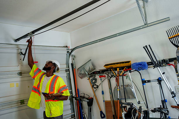 Professional Garage Door Spring Repair technician working in Farmland, IN